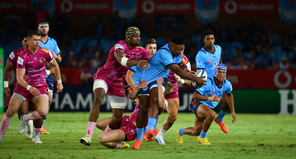 Wandisile Simelane breaks free in a tackle