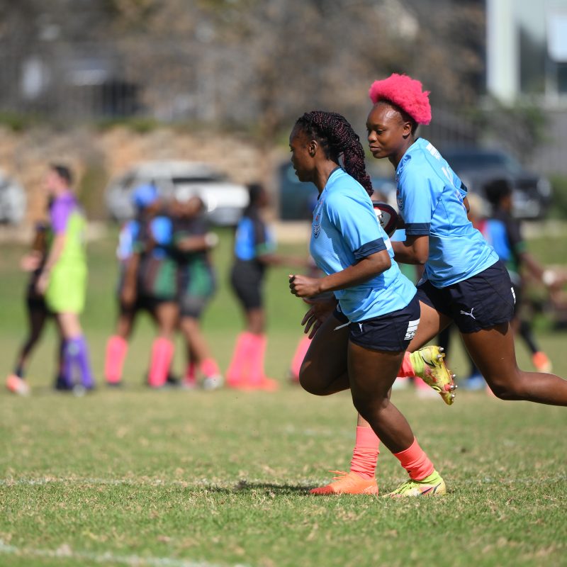 Bulls Daisies teammates in a sprint during warm-up against the Boland Dames at Harlequins Rugby Club (c) Vodacom Bulls/Johan Rynners