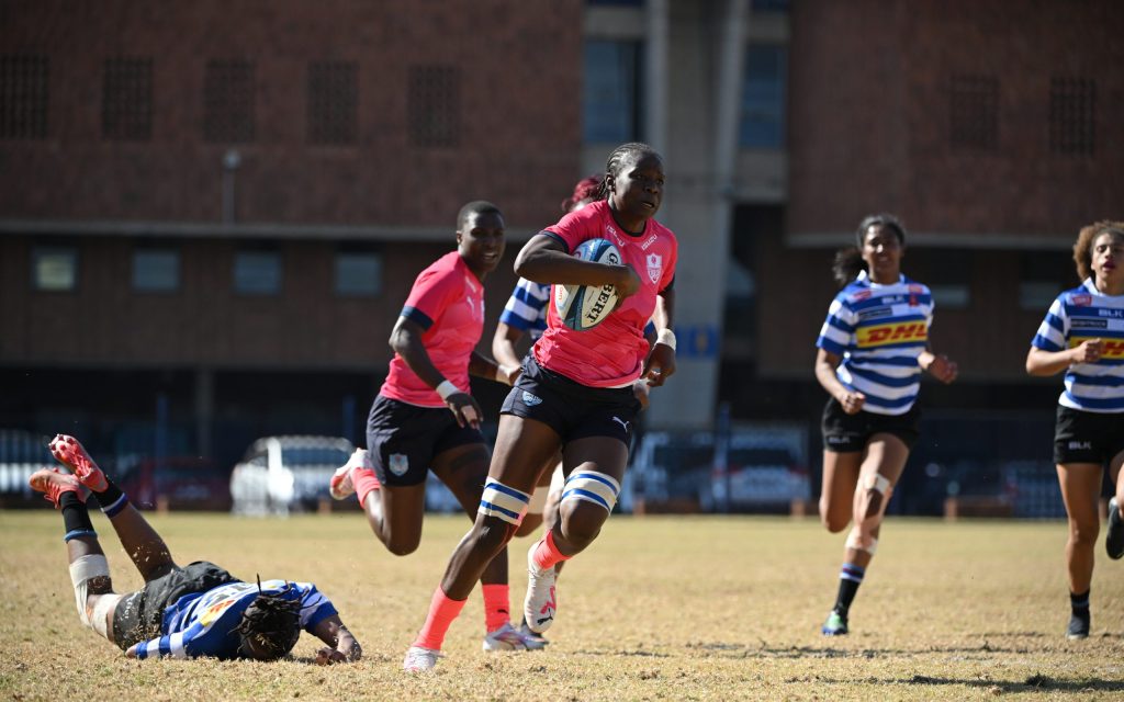 Rights Mkhari of the Bulls Daisies beats the last defender during her team's match against the Western Province at Loftus Versfeld Stadium (c) Vodacom Bulls/Johan Rynners
