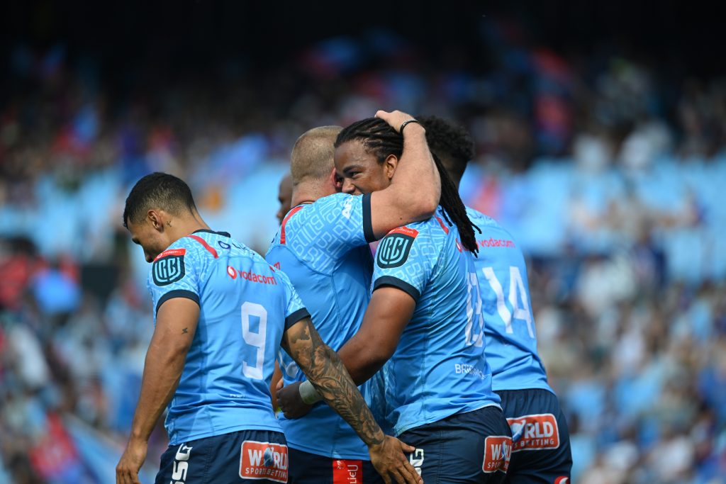 Stedman Gans hugs his teammates after scoring a try against the Sharks at Loftus Stadium (c) Vodacom Bulls/Johan Rynners